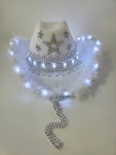 Cowboy con boa, decoración, y estrellas